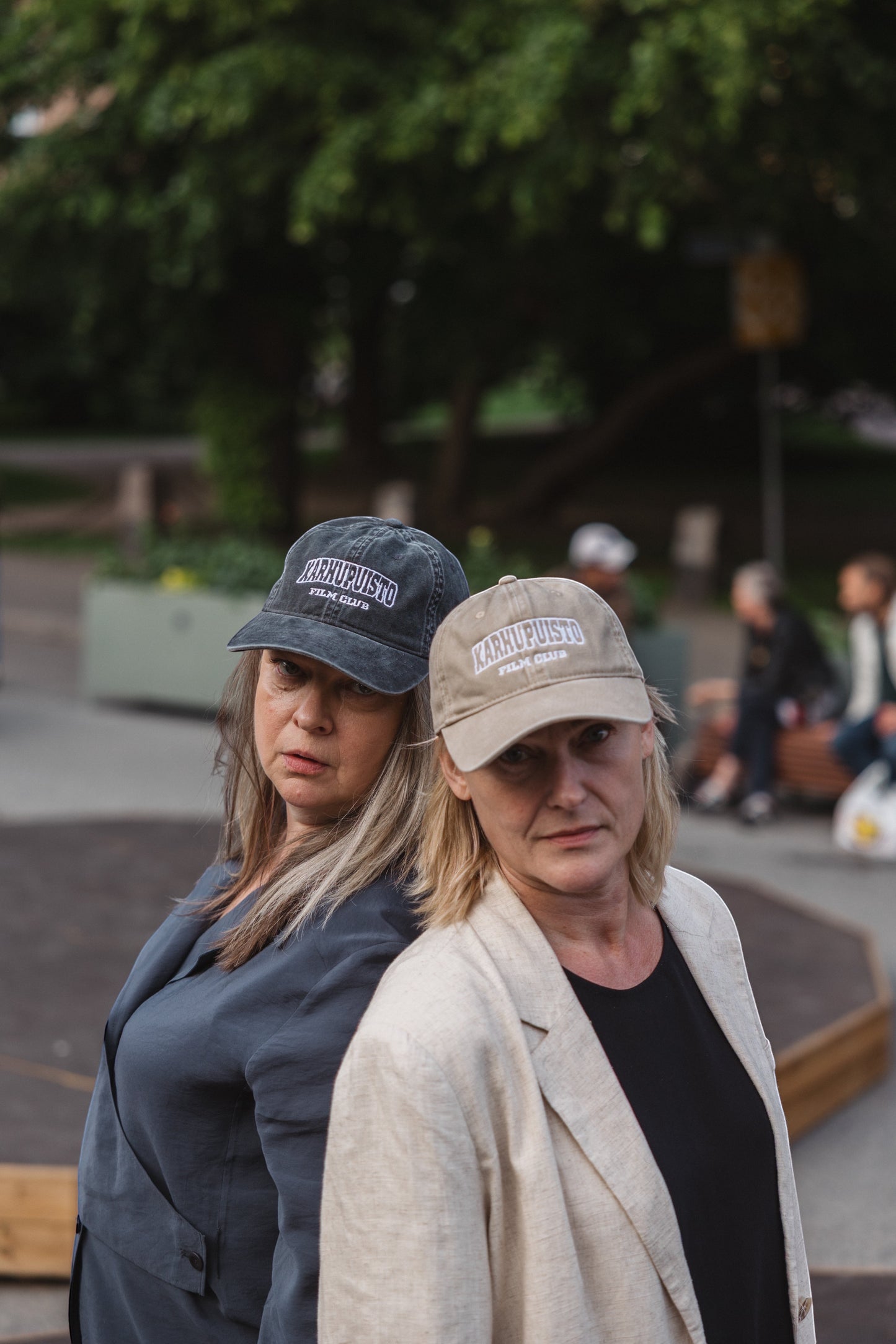 Elina Knihtilä and Pirjo Lonka in Kallio, wearing FC Karhupuisto caps by Karhupuisto Film Festival. Picture taken by Timea Slavic.
