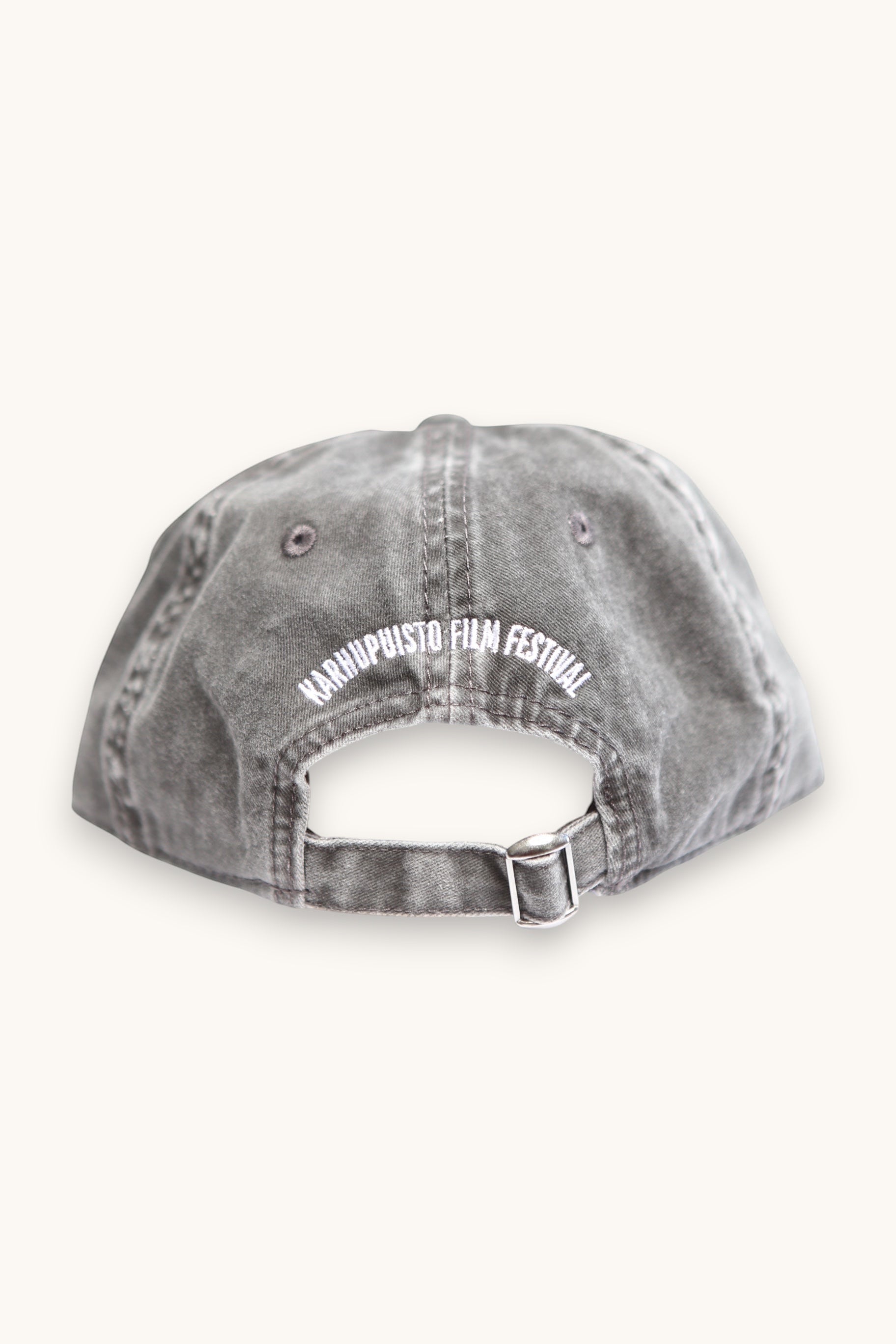 Karhupuisto Film Festival vintage black cotton twill cap with adjustable metal buckle strap and white embroidery
