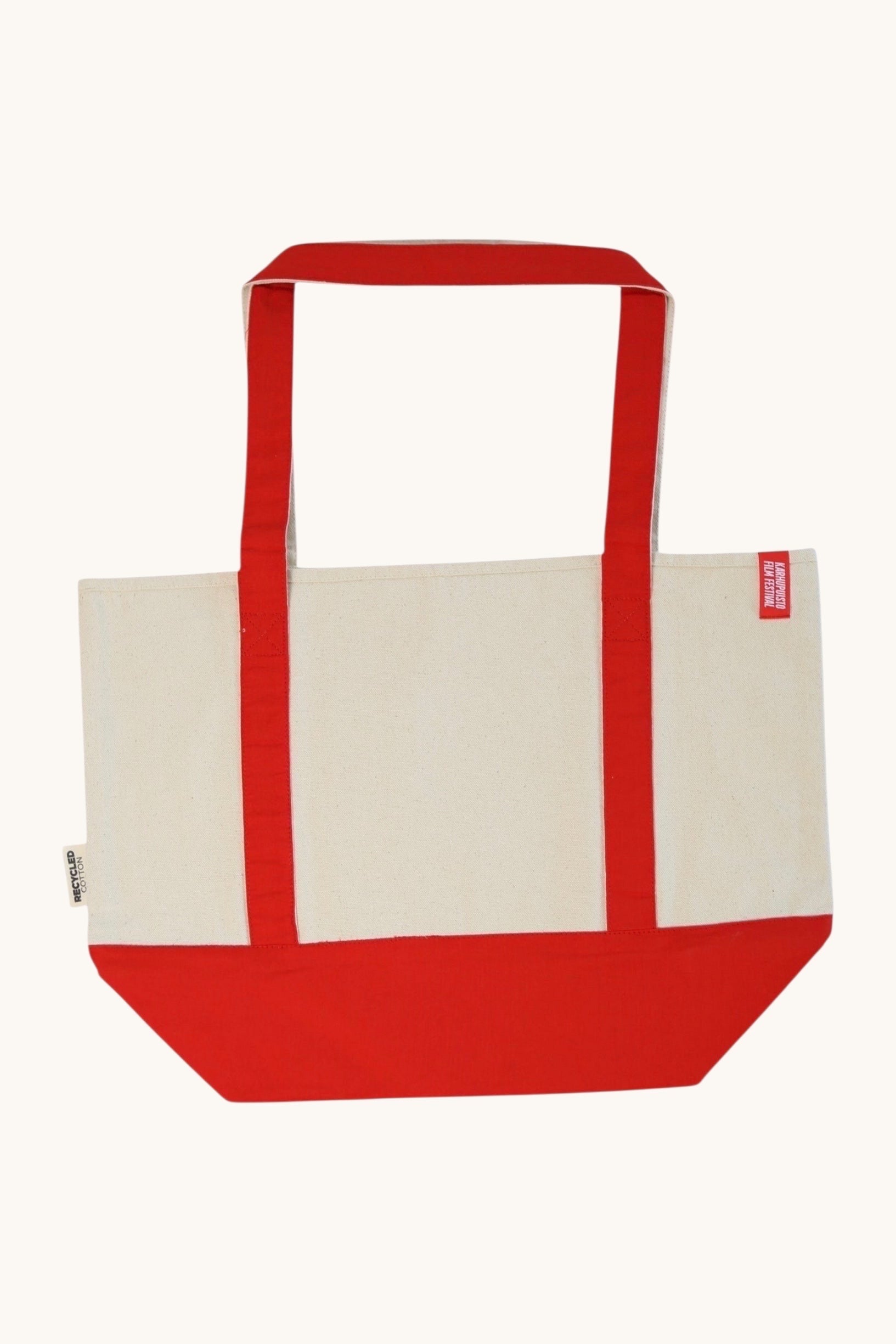 Karhupuisto Film Festival recycled cotton canvas tote bag in cream with red handles and a reinforced red base.