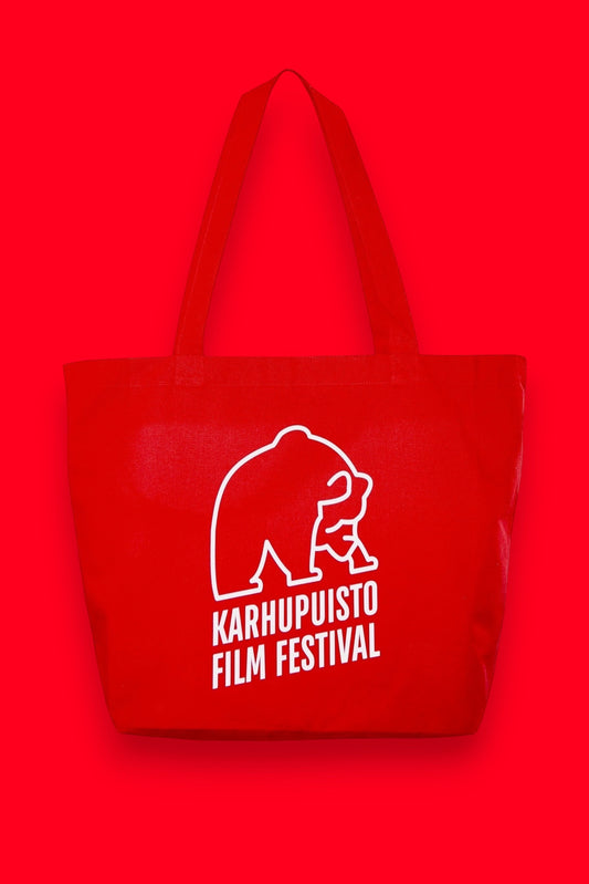 Karhupuisto Film Festival red cotton tote bag with white bear logo print for everyday use.