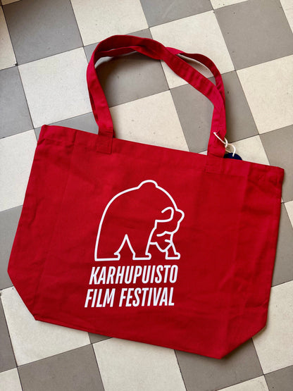 Karhupuisto Film Festival red cotton tote bag with white bear logo print