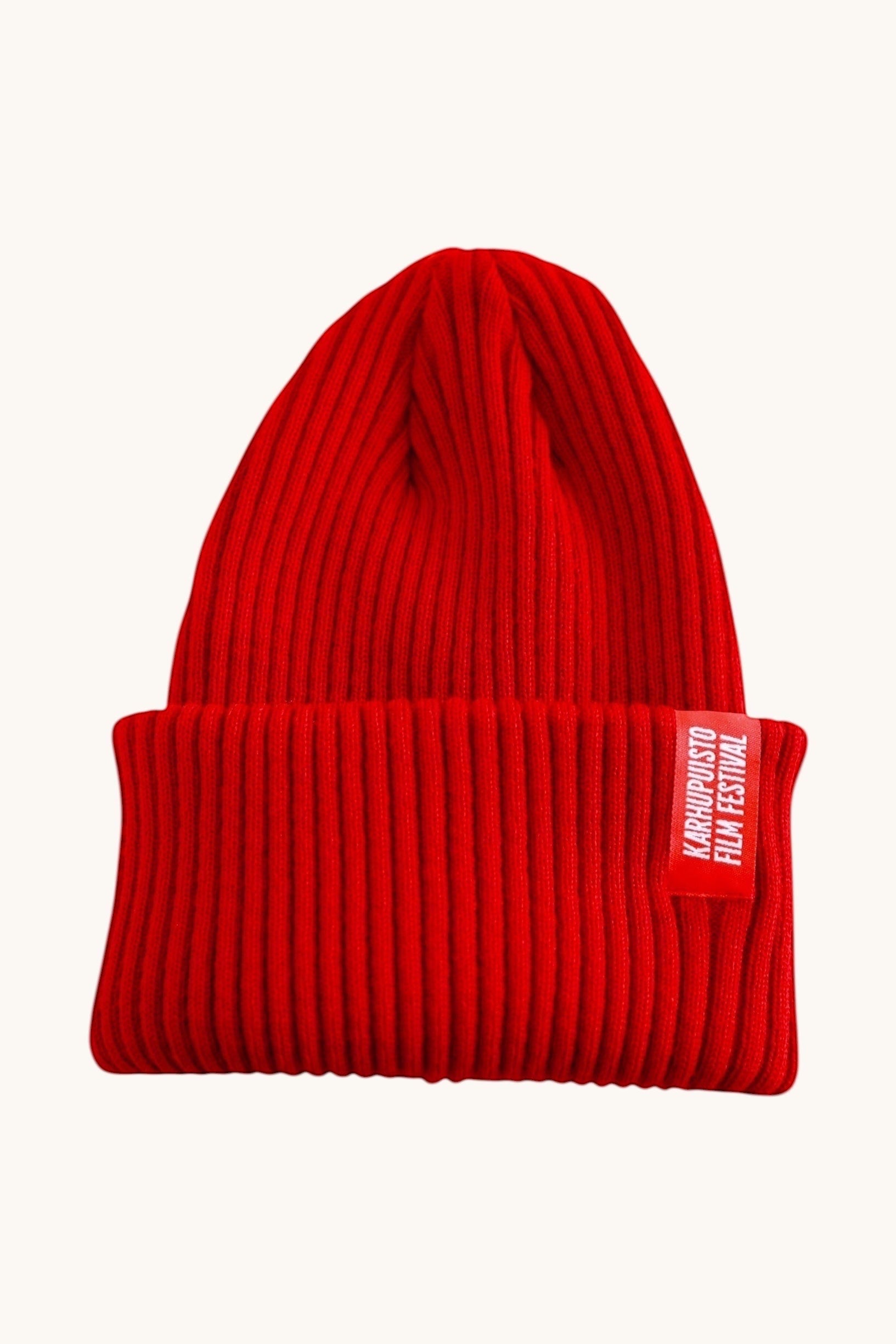 Karhupuisto Film Festival vibrant red ribbed knit beanie with a branded woven label on the cuff